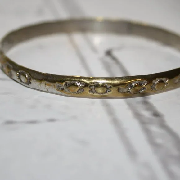 Beautiful Vintage gold bangle bracelet with sun and tribal stamps 7" - Picture 3 of 4